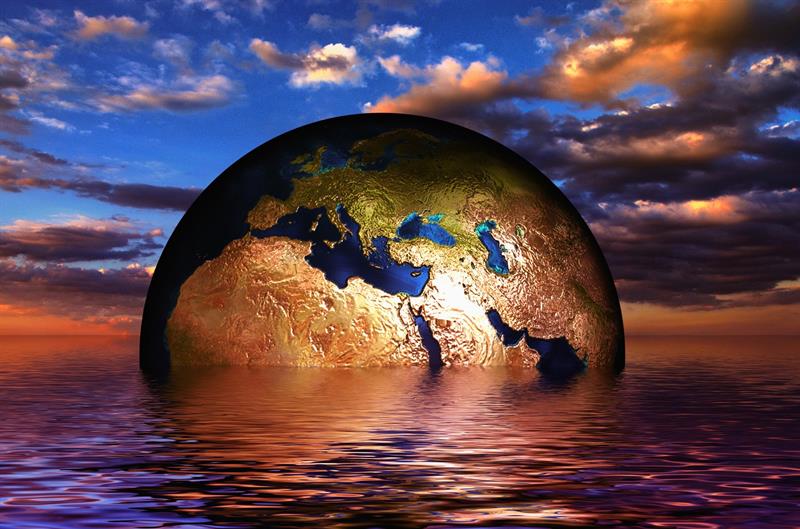 image of a globe rising from water